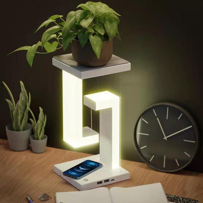 Lámpara de mesa colgante creativa con carga inalámbrica para smartphone, lámpara de equilibrio flotante para el dormitorio del hogar.