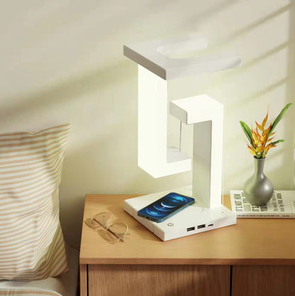 Lámpara de mesa colgante creativa con carga inalámbrica para smartphone, lámpara de equilibrio flotante para el dormitorio del hogar.