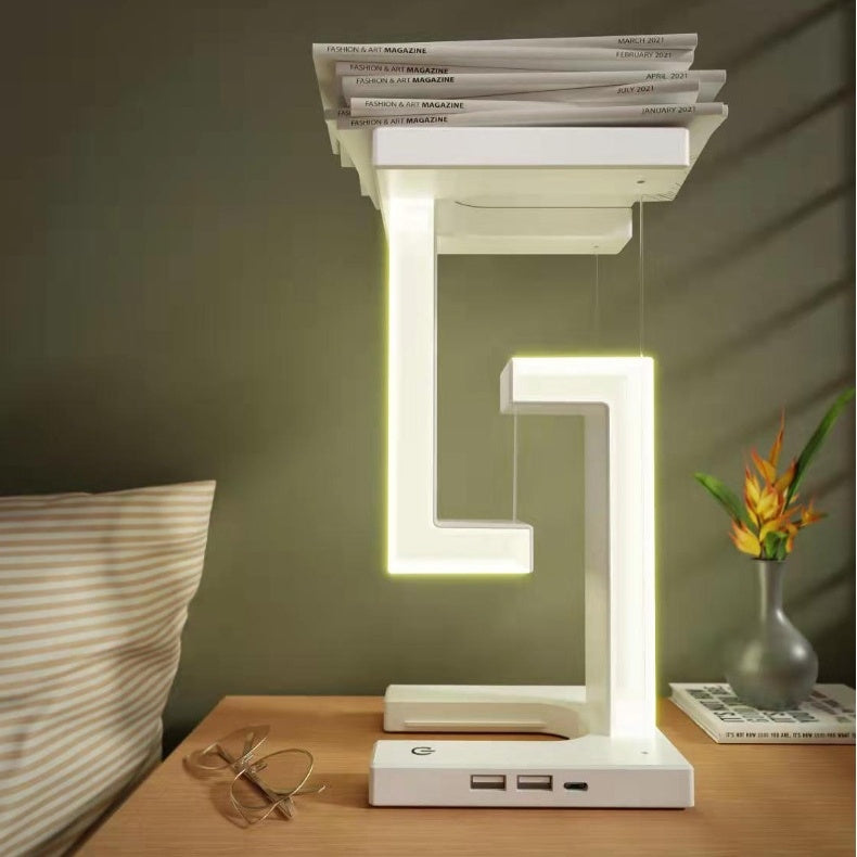 Lámpara de mesa colgante creativa con carga inalámbrica para smartphone, lámpara de equilibrio flotante para el dormitorio del hogar.