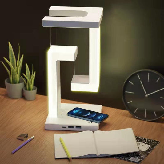 Lámpara de mesa colgante creativa con carga inalámbrica para smartphone, lámpara de equilibrio flotante para el dormitorio del hogar.